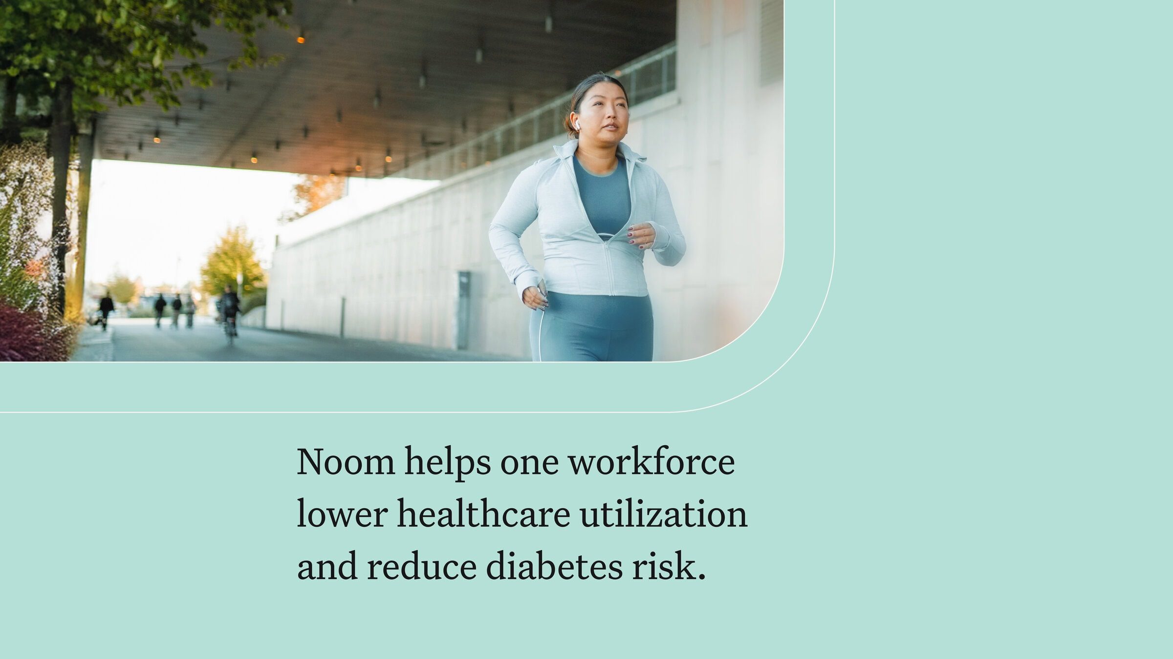 Keeping active outdoors, a woman jogs under a modern overpass, promoting health and wellness with a focus on weight loss and diabetes prevention through Noom.