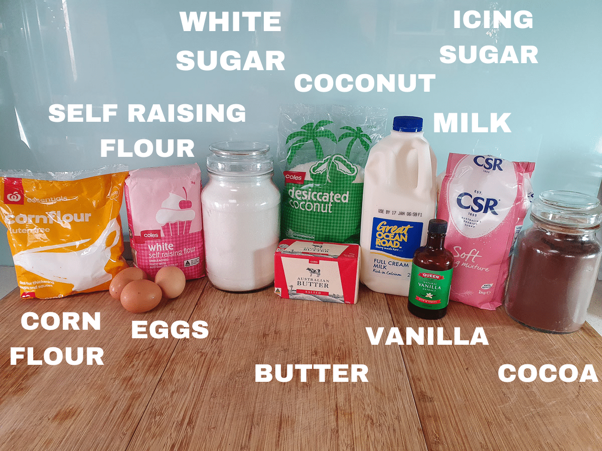 Lamington ingredients, corn flour, eggs, self raising flour, white sugar, butter, coconut, milk, vanilla, icing sugar, cocoa.