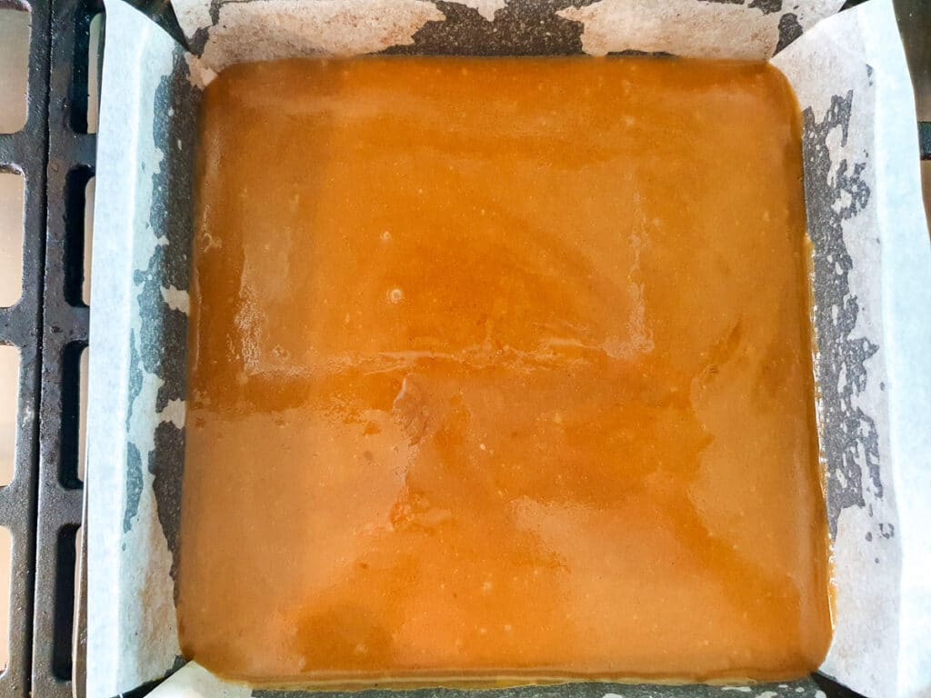 Base with icing poured over ready to set.